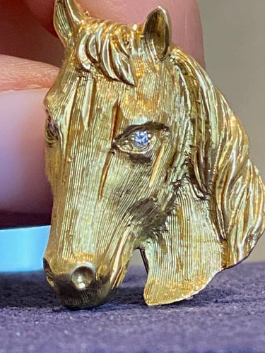 Broche Broche cheval en or jaune et diamants 58 Facettes