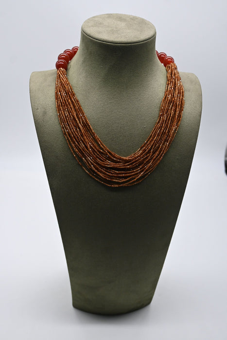 Collier Collier agathe hessonite rouge et bakélite 58 Facettes