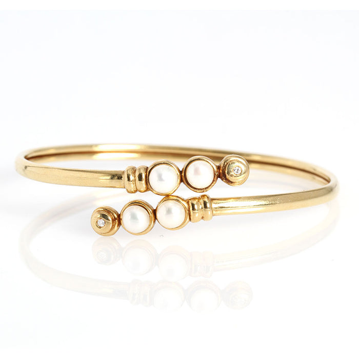 gold bracelet with pearls and diamonds
