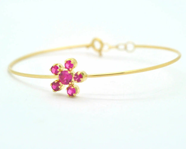 Bracelet Bracelet rigide en or jaune avec rubis synthétiques 58 Facettes 8426