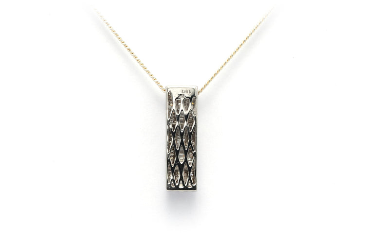Contemporary pendant in 18-carat white gold set with baguette-cut and princess-cut diamonds (+-0.56ct) 