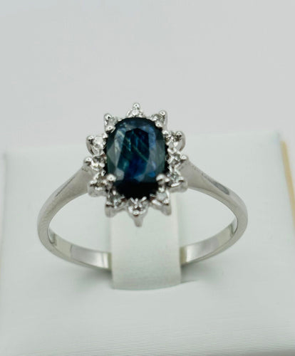 Bague 62 Bague en or blanc, saphir central et diamants 58 Facettes 50212