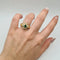 Bague 54 Bague fleur or jaune sertie d'émeraudes, diamants 58 Facettes