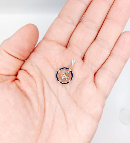 Pendentif Pendentif cible Art Déco or blanc, diamants, saphirs calibrés (circa 1920) 58 Facettes A05269