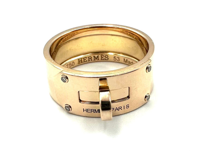 Bague 53 HERMES. Collection "Kelly", bague or rose 18K et diamants 58 Facettes