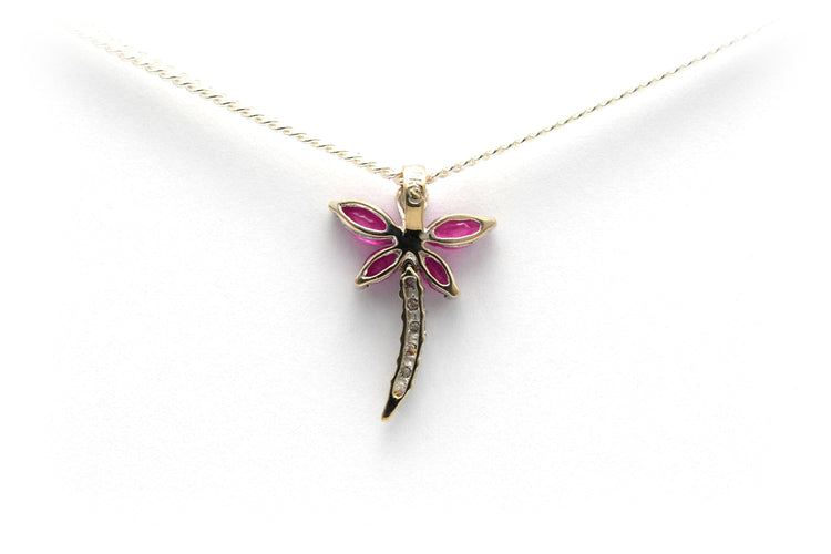 Pendentif Pendentif contemporain en or blanc serti de rubis et de diamants 58 Facettes B281