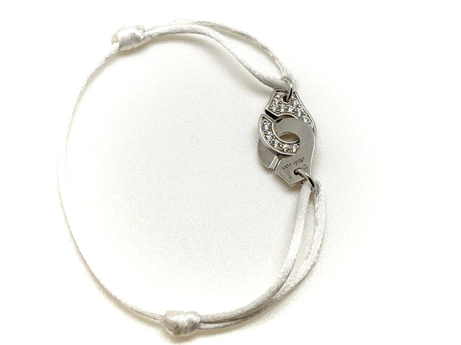Bracelet DINH VAN - Bracelet menottes or blanc diamants 58 Facettes M8912