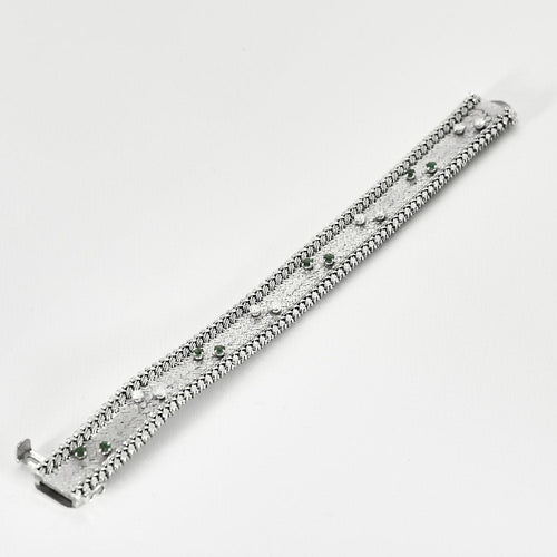 Bracelet Elegant Bracelet en or gris ,diamants et émeraudes 58 Facettes HAV1009