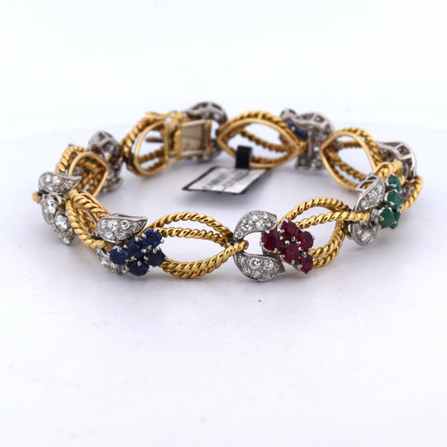 Bracelet Bracelet en or jaune orné de diamants et de pierres de couleur 58 Facettes