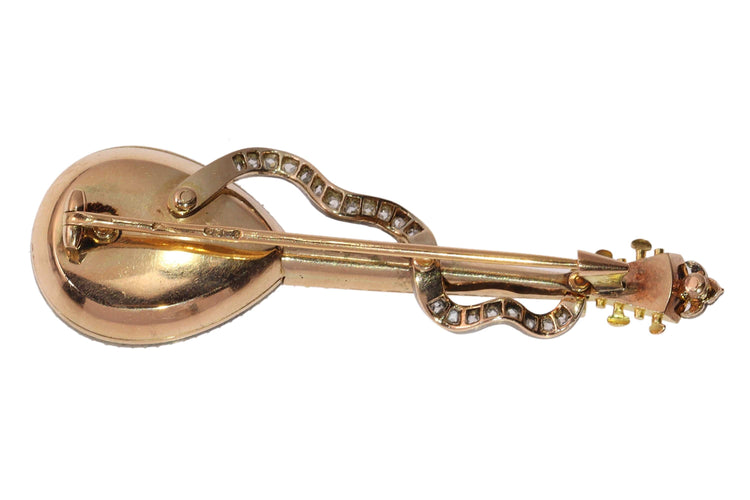 Broche Broche mandoline ornée de diamants, de rubis et de perles, de style victorien français 58 Facettes 14185-0013