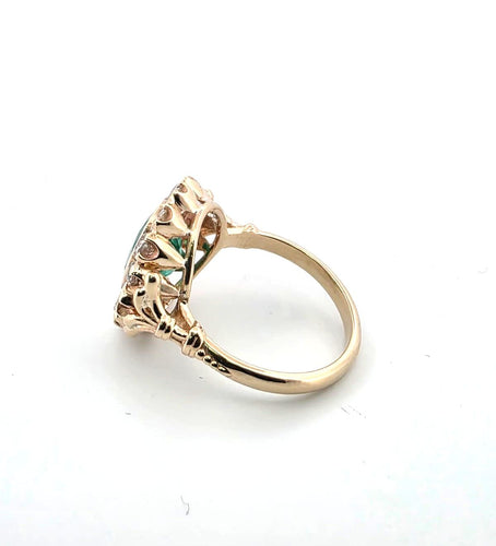 Anello in oro giallo e argento con smeraldo e diamanti 