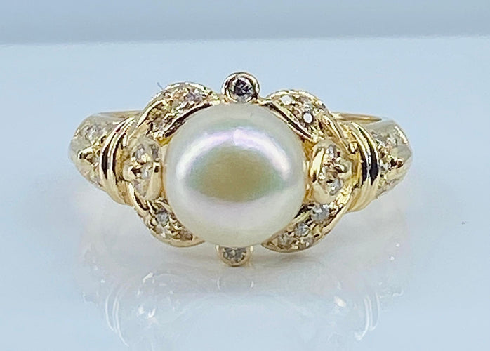 Bague 52 Bague en or jaune 18 carats, perle et 38 diamants 58 Facettes AB448