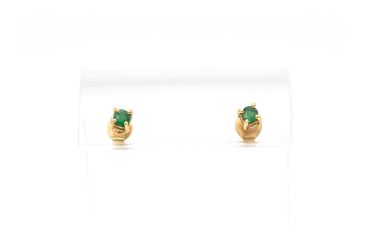 Contemporary earrings in 18-carat yellow gold set with emeralds 