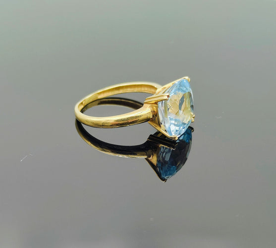 Bague 50 Bague en or avec topaze bleu clair 58 Facettes