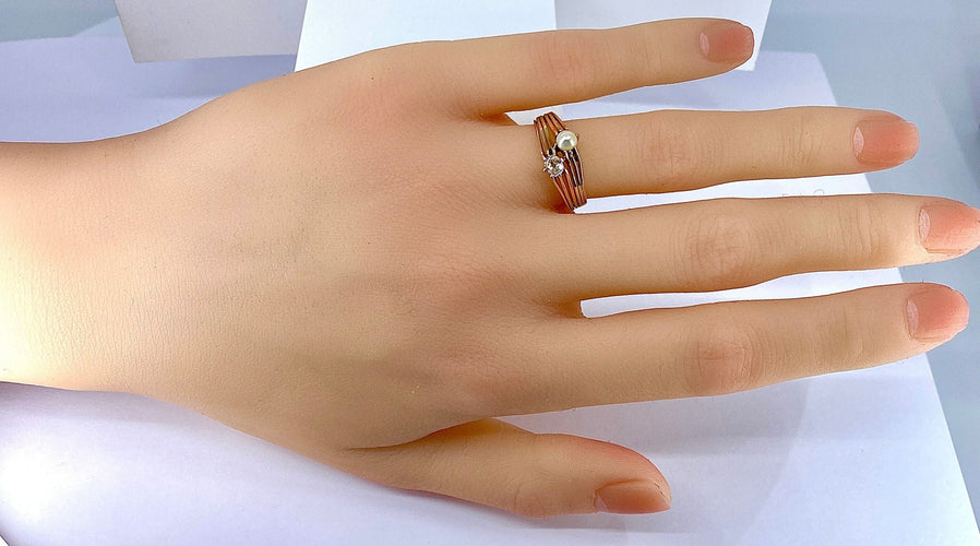 Ringa Toi & Moi i gult guld, diamant och pärla omkring 1900