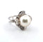 Bague 52 Bague en or blanc avec perle et diamants 58 Facettes