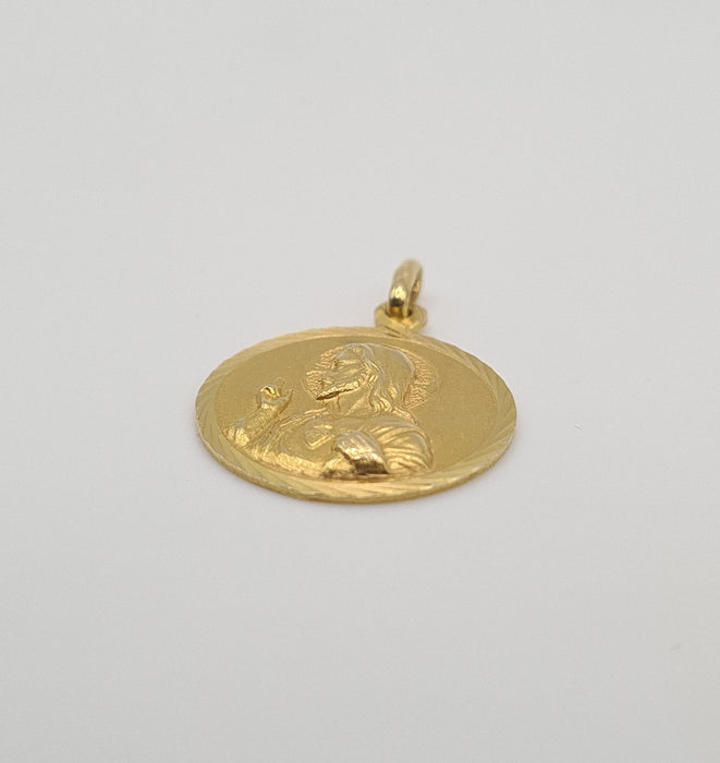 Yellow gold religious pendant