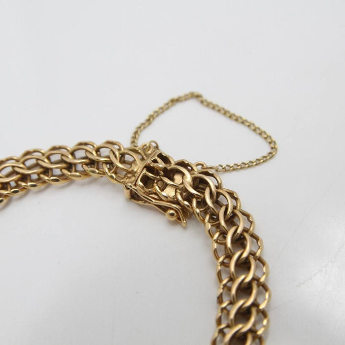 Pulsera entrelazada en oro amarillo