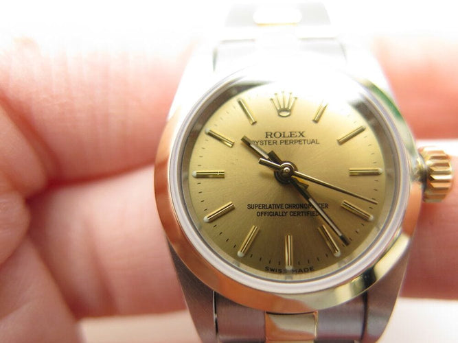 Montre vintage montre ROLEX 76183 oyster perpetual lady or & acier garantie auto 58 Facettes 265437