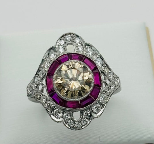 Platinum ring with diamonds and rubies. Art Deco style. 