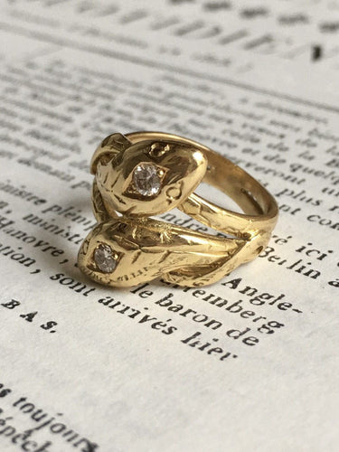 Bague 51 Bague ancienne en or jaune 18K représentant deux serpents 58 Facettes