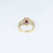 Bague 50 Bague en or jaune, sertie d'un rubis taille ovale entouré de diamants 58 Facettes 001.41417