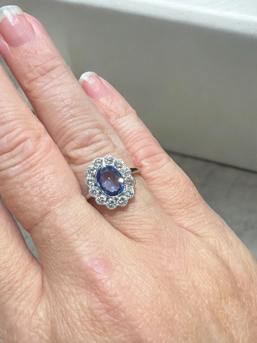 white gold ring with sapphire and brilliant surround