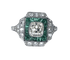 Art Deco cushion ring in platinum and diamonds, emeralds 