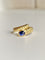 Bague 53 Bague godronnée serpent en or jaune 18k et saphir cabochon 0,55 ct 58 Facettes