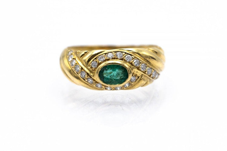 Bague Bague vintage en or jaune 18k avec émeraude et diamants 58 Facettes 11776