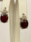 Boucles d'oreilles Boucles d'oreilles puces exquises en or blanc, serties d'un rubis rouge de 4,32 carats et de diamants 58 Facettes