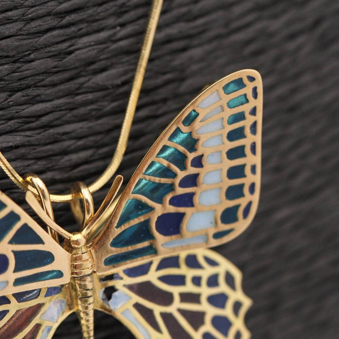 Butterfly in gold and enamel. Dual function