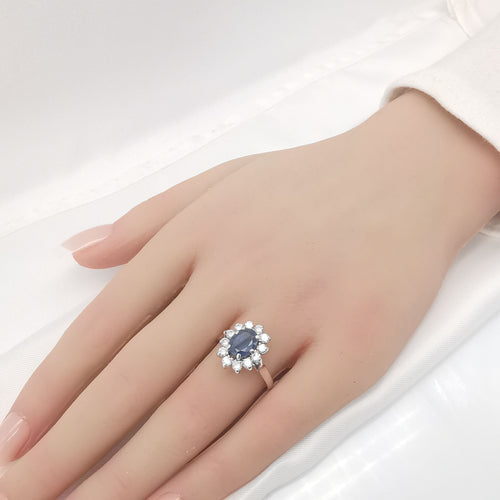 Bague 56 Bague marguerite en or saphir et diamants 58 Facettes