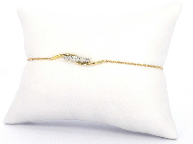Bracelet Bracelet en or jaune avec diamants sertis en rang 58 Facettes 2361