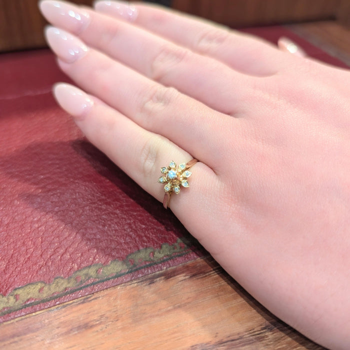 Yellow gold floral ring with diamonds