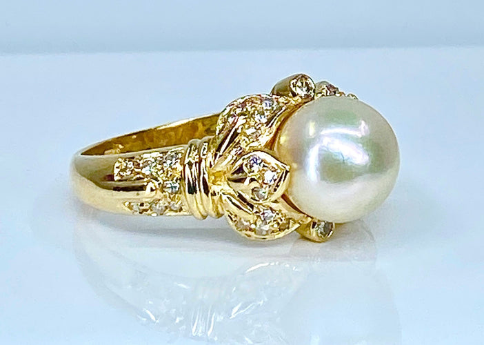 Bague 52 Bague en or jaune 18 carats, perle et 38 diamants 58 Facettes AB448