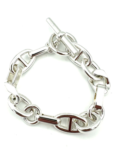 Bracelet HERMES. Collection "Aléas" bracelet argent 925/00 PM 58 Facettes