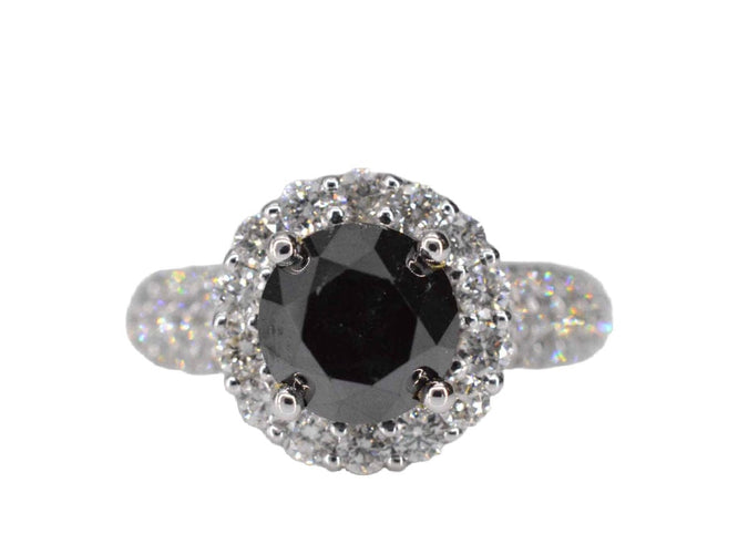 Bague 54 Bague entourage en or blanc avec gros diamants et un diamant noir 58 Facettes 2049