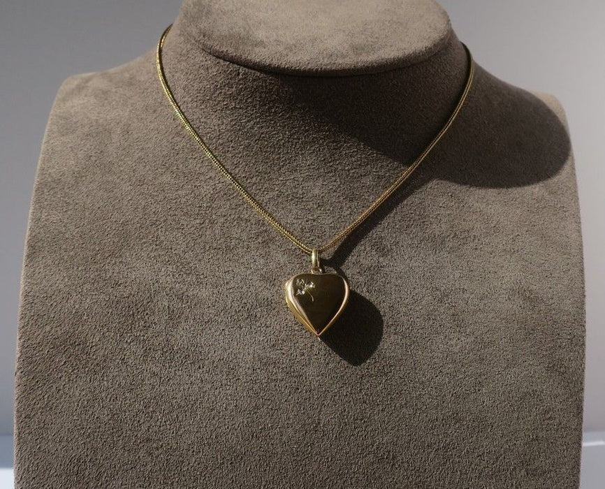 Diamond opening heart pendant