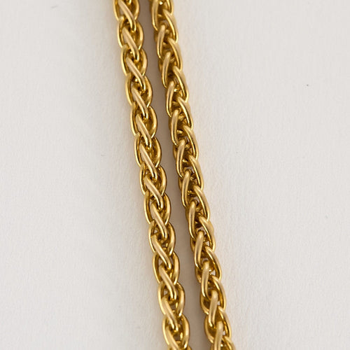 Collier Chaîne en or jaune et coulant Serpent en or gris et diamants et émeraude 58 Facettes SNA1712