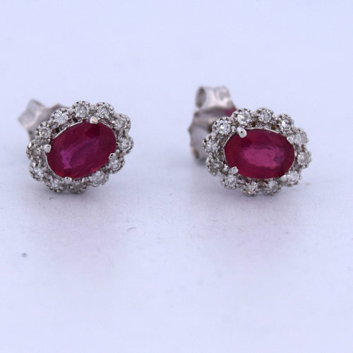 Ohrringe aus Weißgold mit Rubinen und Diamanten 