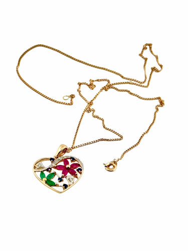 Collier Collier en or et pierres précieuses 58 Facettes