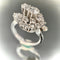 Bague 57.5 Bague tourbillon or blanc diamants 58 Facettes