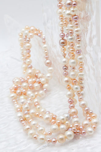 Collier Collier long perle d'eau douce 58 Facettes 250472