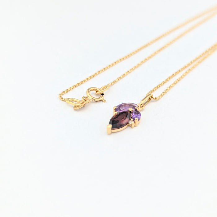 Yellow gold, diamond, amethyst, garnet necklace