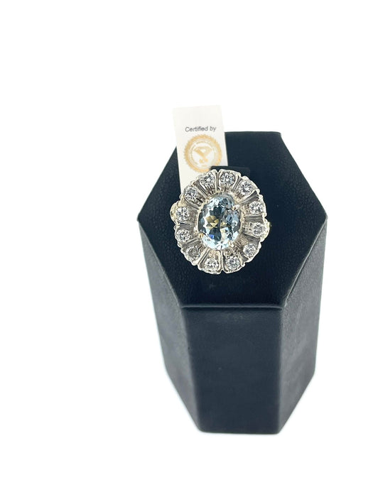 Ring in yellow gold and silver , aquamarine and diamonds