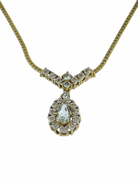 Collier Collier en or blanc et jaune avec diamants et aiguemarine 58 Facettes