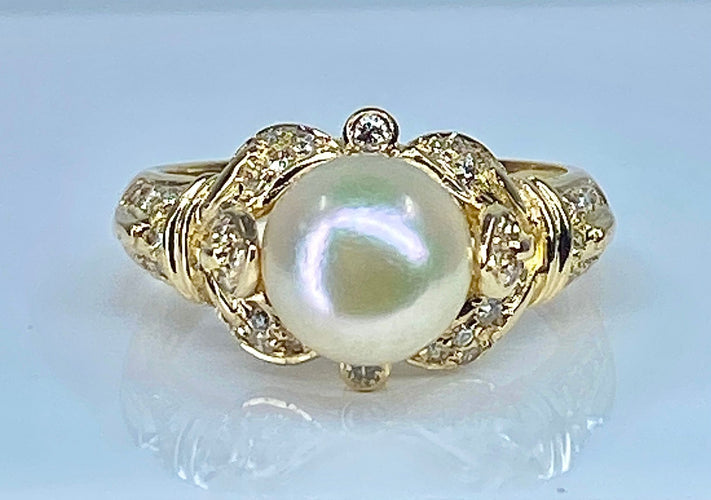 Bague 52 Bague en or jaune 18 carats, perle et 38 diamants 58 Facettes AB448