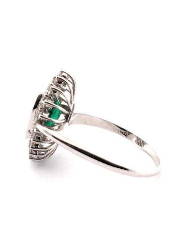 Bague 61 Bague en or blanc avec émeraude centrale et diamants environnants 58 Facettes