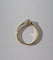 Bague 57 Bague solitaire deux ors, diamant taille brillant 58 Facettes